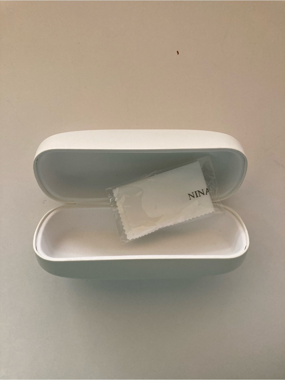 Nina Ricci White Hard Shell Eyeglass Case with Branded Cleaning Cloth